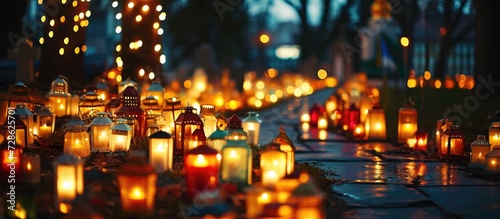 All Saints' Day commemoration with an assortment of grave lanterns near the cemetery.