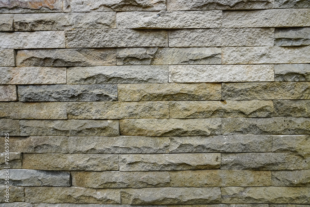 Neatly arranged natural stone wall background Neatly arranged natural stone wall background