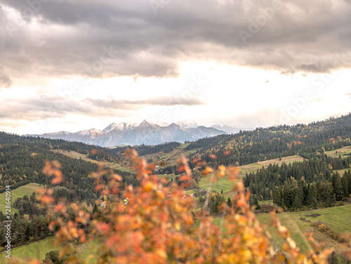 Fototapeta Naklejka Na Ścianę i Meble -  view of the mountains from another mountain in autumn	