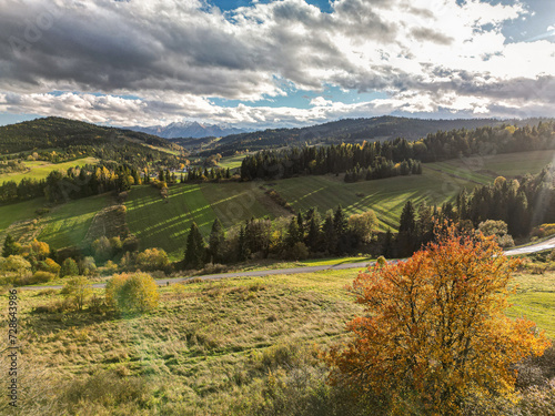 Fototapeta Naklejka Na Ścianę i Meble -  view of the mountains from another mountain in autumn	