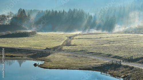 Fotografie wafts of fog in the mountains of Austria