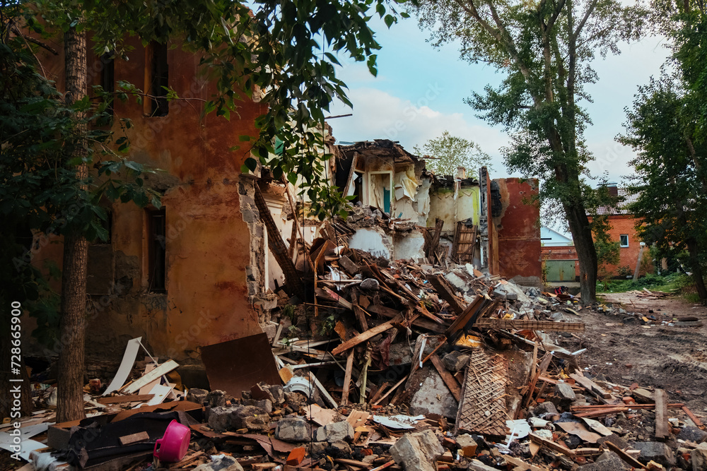 Ruined house. Result of military conflicts or natural disasters concept Ruined house. Result of military conflicts or natural disasters concept
