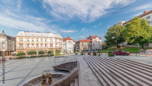Panorama showing Sulkowski Castle and fountain on Chrobry Square in Bielsko-Biala timelapse, Poland.