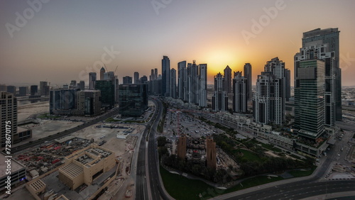 Panorama of Bay Avenue with modern towers residential development in Business Bay aerial all day timelapse © neiezhmakov