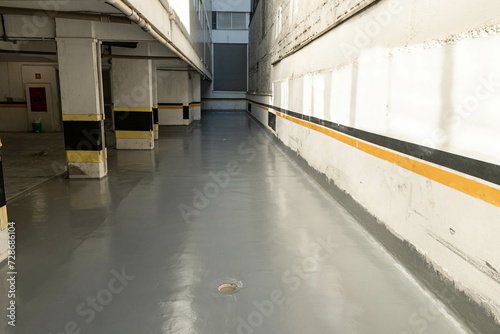 Wallpaper Mural Construction and painting of parking garage floor at a building Torontodigital.ca