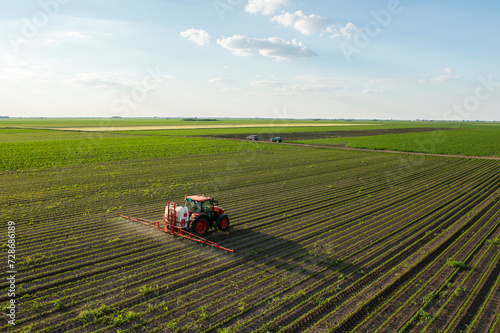 Spraying pesticides at soy bean fields