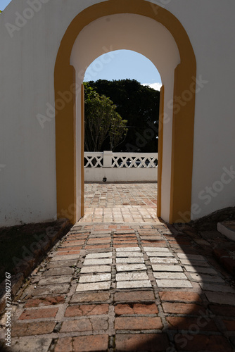 church door to landscape view in a suny day in the city