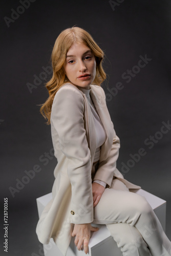 Happy attractive blonde woman in white clothes. Smiling at camera, closeup portrait, panorama with copy space. Face and skin care at home concept