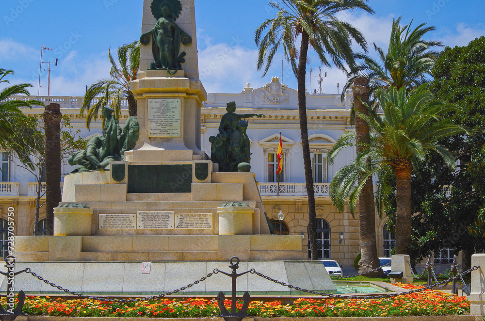 Obraz premium Romantic backstreet, side street and alleys in historic old town of Cartagena, Spain with historic Spanish style architecture facades, a landmark sightseeing tourist spot in downtown