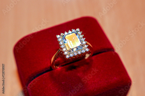 Blue Topaz Gold Ring Square Stone. Swiss Blue Topaz. Blue Gemstone. Prong Setting Rectangular Ring. Ring Jewelry Box. Red Velvet Ring Box © Dmitry Koshelev