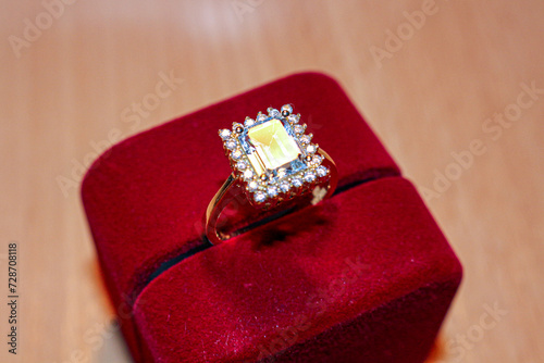 Blue Topaz Gold Ring Square Stone. Swiss Blue Topaz. Blue Gemstone. Prong Setting Rectangular Ring. Ring Jewelry Box. Red Velvet Ring Box © Dmitry Koshelev