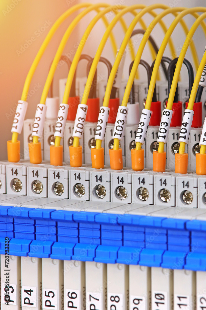 Marking of insulated wires with a tape on which the marking is printed.Sunflare.