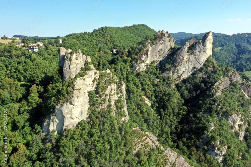 The pinnacles of rocks stand out in the Park of Sassi di Rocca Malatina. Modena, Vignola, Roccamalatina, Italy The pinnacles of rocks stand out in the Park of Sassi di Rocca Malatina. Modena, Vignola, Roccamalatina, Italy