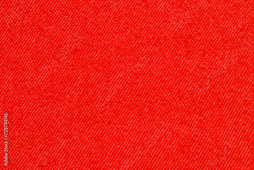 Red cotton twill fabric pattern close up as background 