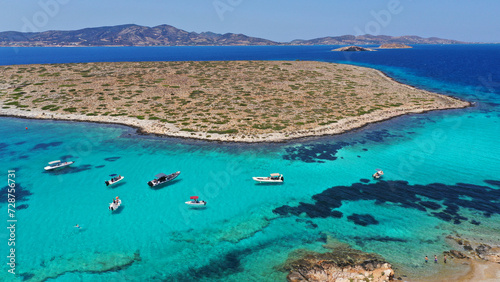 Obraz na płótnie Aerial drone photo of azure paradise blue lagoon of Panteronisi a small islet complex between Paros and Antiparos islands visited by yachts and sail boats, Cyclades, Greece w salonie