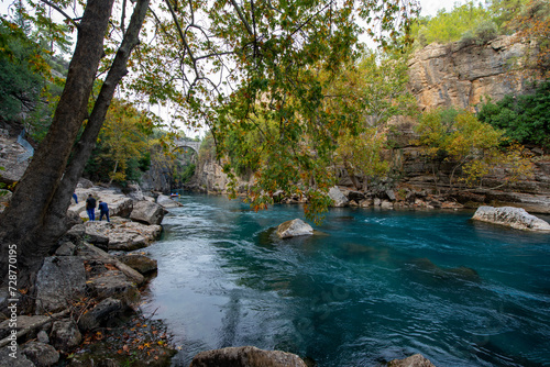 Transparent waters of Kopru River (Köprüçay, ancient Eurymedon) with its emerald green colour in Koprulu Canyon (Köprülü Kanyon) National Park, Antalya, Turkey. It's a rafting paradise