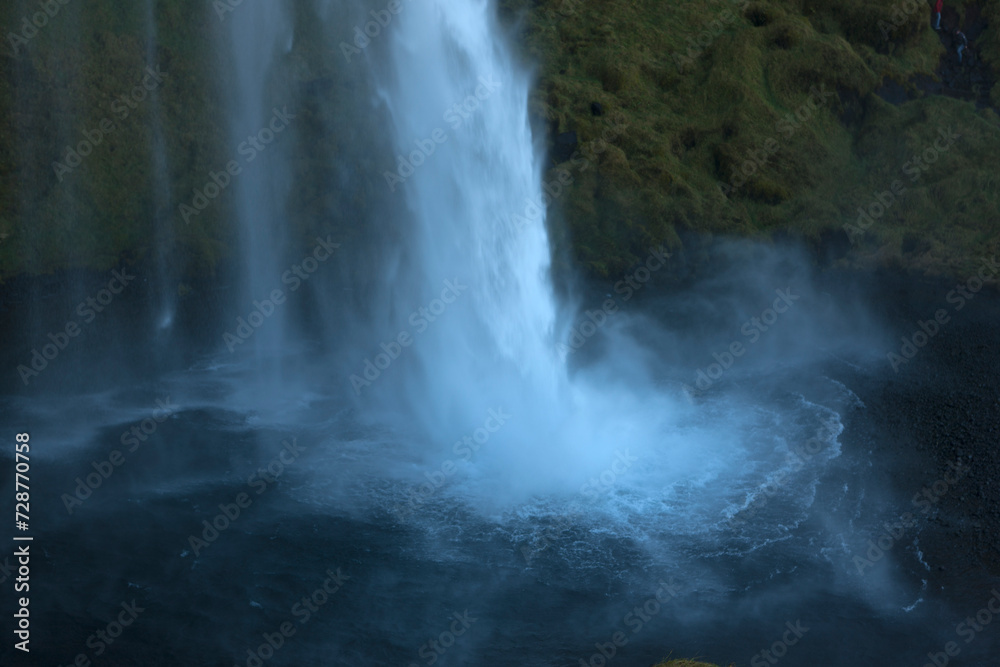 Iceland. Skóugafoss waterfall on a sunny summer day. Iceland. Skóugafoss waterfall on a sunny summer day.