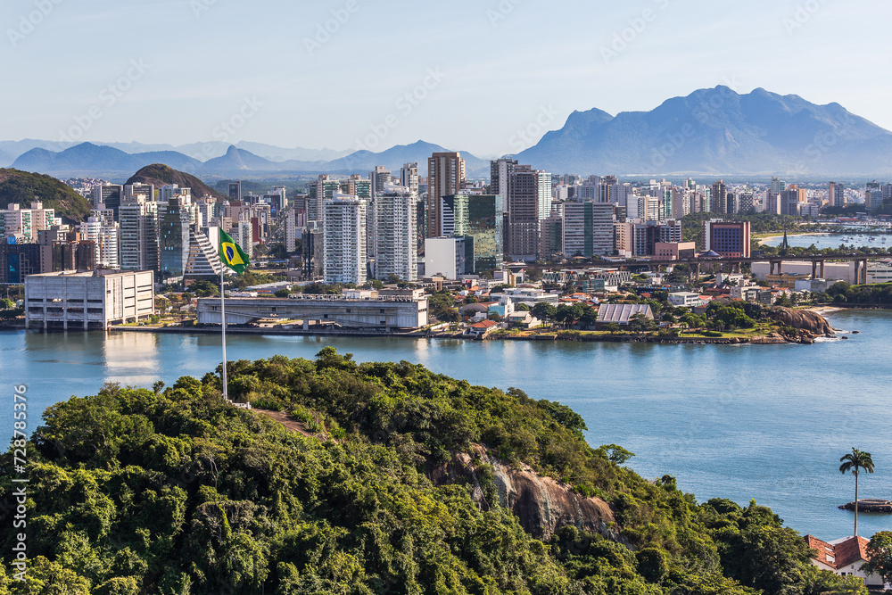 View of the city of Vitória, capital of Espírito Santo, during a beautiful morning with sunshine and blue sea. View from the Penha Convent, in Vila Velha.