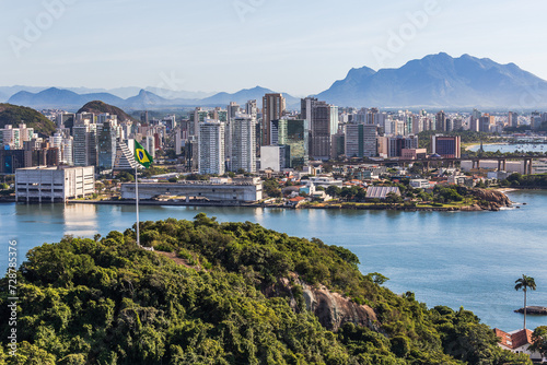 View of the city of Vitória, capital of Espírito Santo, during a beautiful morning with sunshine and blue sea. View from the Penha Convent, in Vila Velha. photo