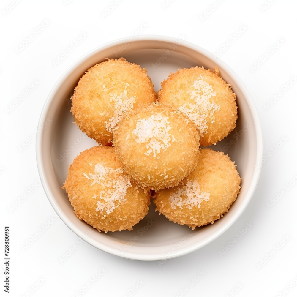 Chhena poda in a white bowl top view isolated on a white background Chhena poda in a white bowl top view isolated on a white background