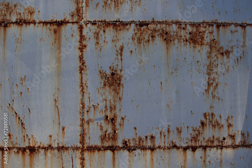 Rusty metal background with streaks of rust.