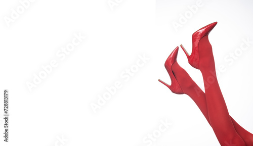 Red tights and high heels on isolated white backgroud. photo