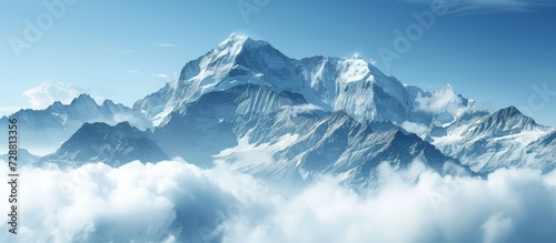 Beautiful landscape of majestic mountain peaks summits with snow capped with cloudy. AI generated photo