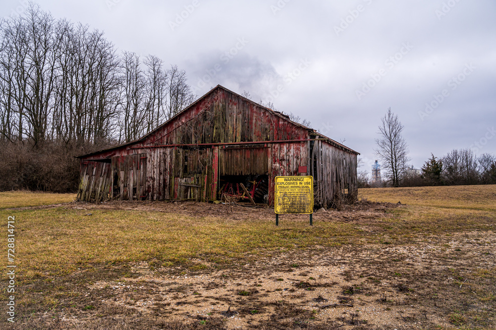 Old Barn and Explosives Sign Old Barn and Explosives Sign