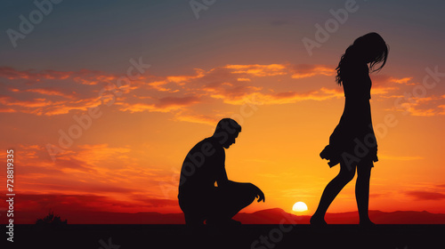 Marriage proposal rejection. Silhouette of female rejecting and breaking up with male at sunset photo