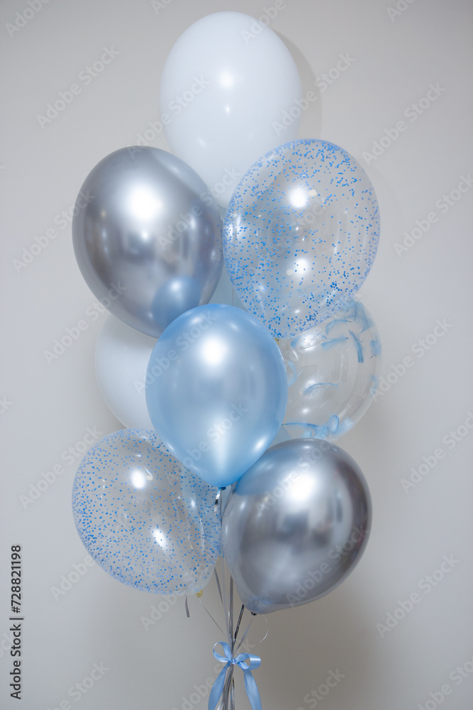silver and blue balloons on a white background, happy birthday greeting silver and blue balloons on a white background, happy birthday greeting