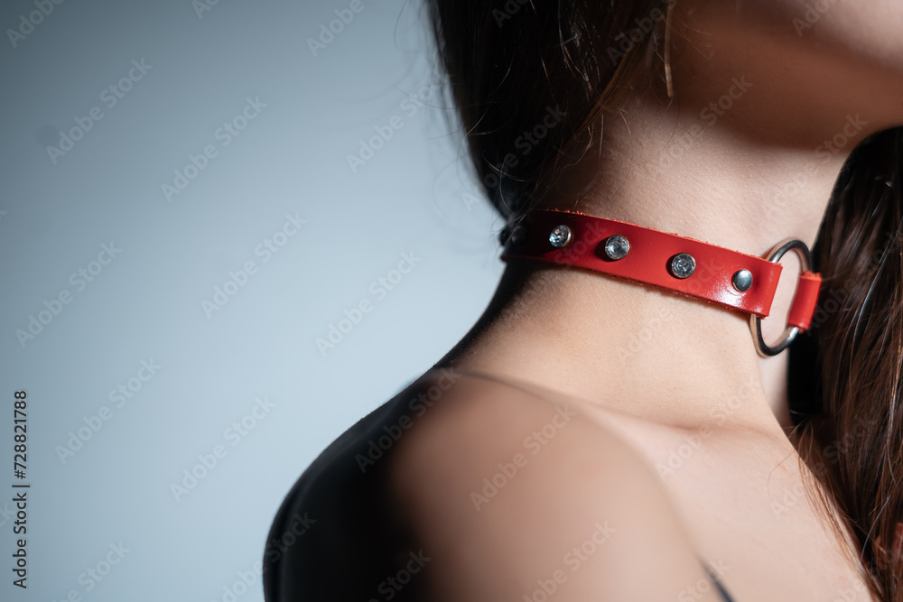 young woman in red leather bdsm collar with metallic ring, female in seductive role playing game sexy choker - obrazy, fototapety, plakaty 