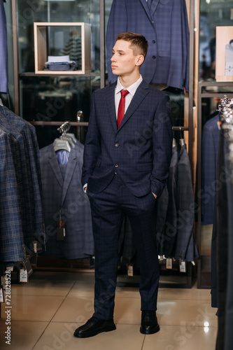 The image seems to show a man wearing a suit and tie. 6034