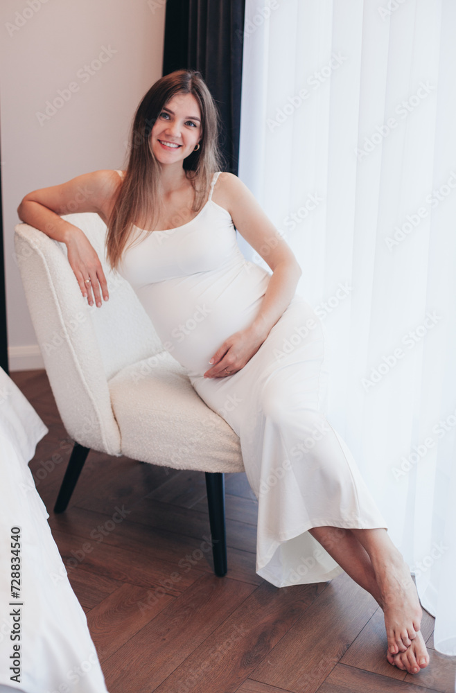 pregnant woman and husband at home pregnant woman and husband at home