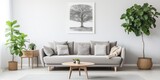 Contemporary Scandinavian living room with a grey sofa, plants, coffee table, carpet, and personal accessories in cozy home decor.
