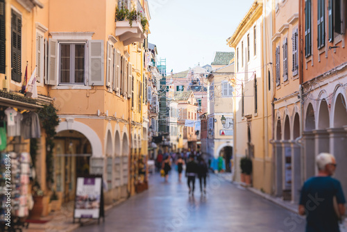 Fototapeta Naklejka Na Ścianę i Meble -  Corfu street view, Kerkyra old town beautiful cityscape, Ionian sea Islands, Greece, a summer sunny day, pedestrian streets with shops and cafes, architecture of historic center, travel to Greece