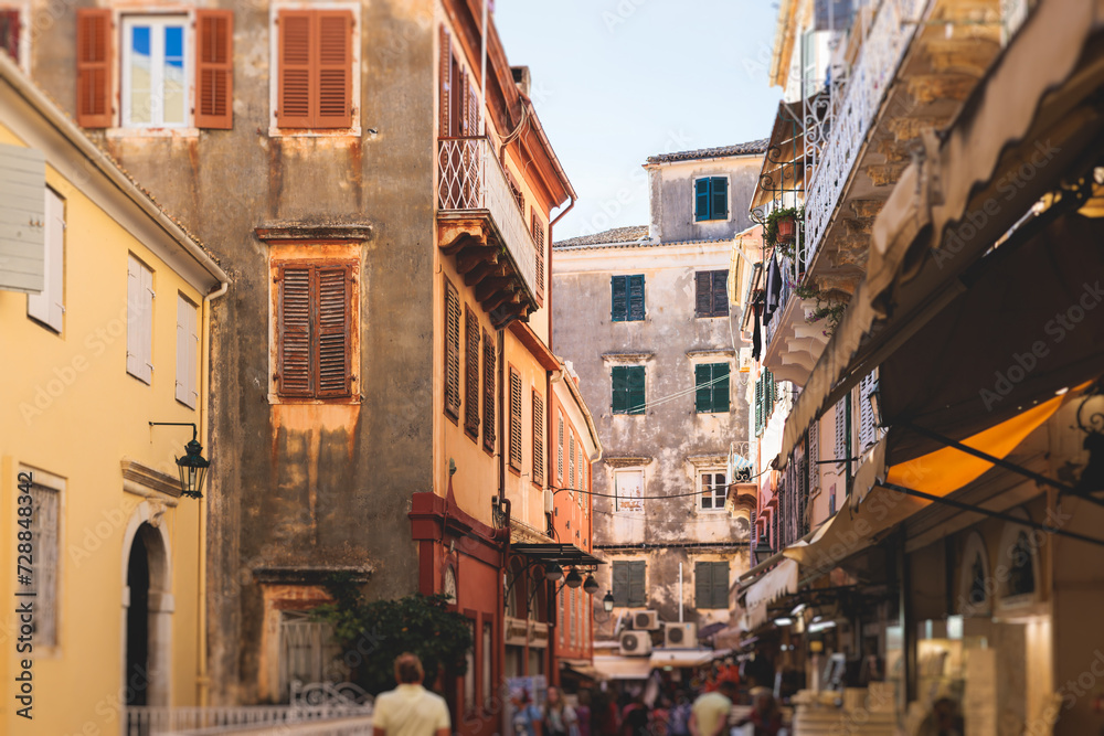 Corfu street view, Kerkyra old town beautiful cityscape, Ionian sea Islands, Greece, a summer sunny day, pedestrian streets with shops and cafes, architecture of historic center, travel to Greece