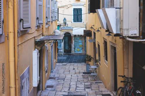 Corfu street view, Kerkyra old town beautiful cityscape, Ionian sea Islands, Greece, a summer sunny day, pedestrian streets with shops and cafes, architecture of historic center, travel to Greece © tsuguliev