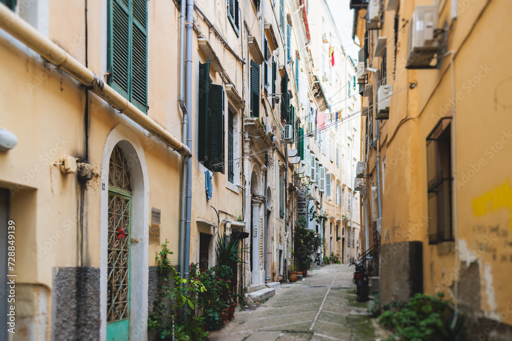 Corfu street view, Kerkyra old town beautiful cityscape, Ionian sea Islands, Greece, a summer sunny day, pedestrian streets with shops and cafes, architecture of historic center, travel to Greece