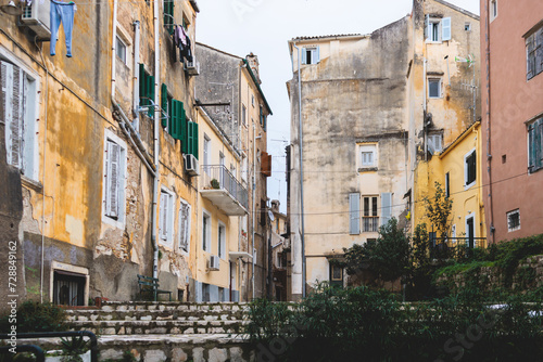 Fototapeta Naklejka Na Ścianę i Meble -  Corfu street view, Kerkyra old town beautiful cityscape, Ionian sea Islands, Greece, a summer sunny day, pedestrian streets with shops and cafes, architecture of historic center, travel to Greece