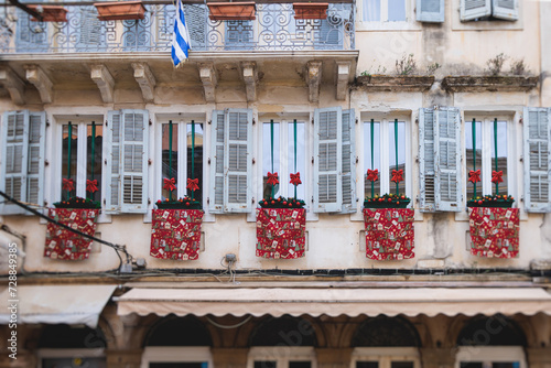 Fototapeta Naklejka Na Ścianę i Meble -  Corfu street view, Kerkyra old town beautiful cityscape, Ionian sea Islands, Greece, a summer sunny day, pedestrian streets with shops and cafes, architecture of historic center, travel to Greece