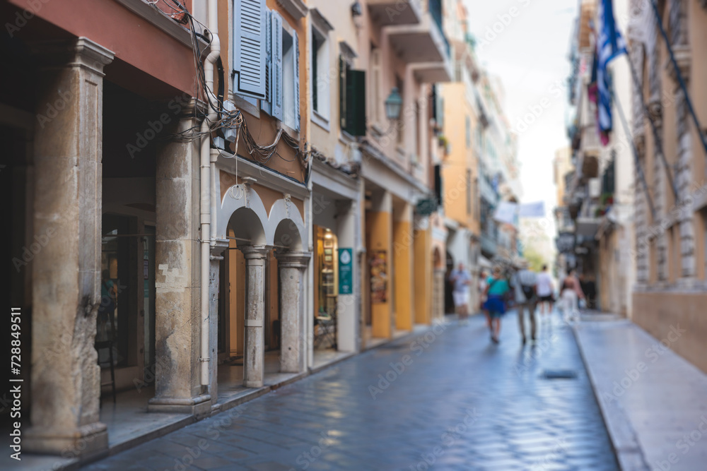Corfu street view, Kerkyra old town beautiful cityscape, Ionian sea Islands, Greece, a summer sunny day, pedestrian streets with shops and cafes, architecture of historic center, travel to Greece