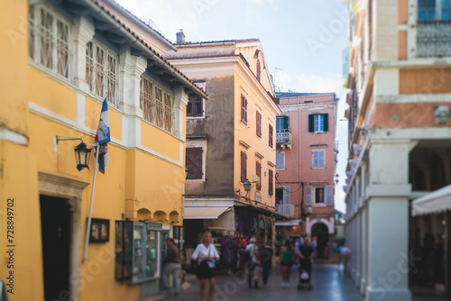Fototapeta Naklejka Na Ścianę i Meble -  Corfu street view, Kerkyra old town beautiful cityscape, Ionian sea Islands, Greece, a summer sunny day, pedestrian streets with shops and cafes, architecture of historic center, travel to Greece