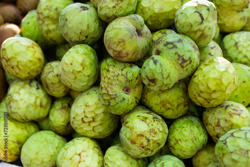 Organic chirimoya fruits or custard apples ready for sale in greengrocery