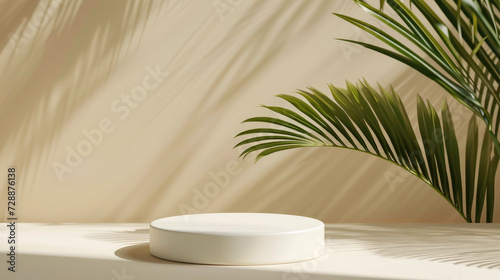 Mock up with round podium stone textured pedestal with natural soft shadow from palm leaves on beige background for product presentation or showcase © eireenz
