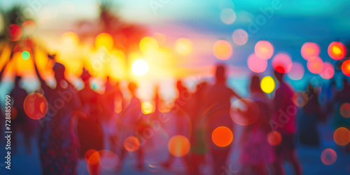 Party beach. Blurred people having night beach party in summer vacation photo