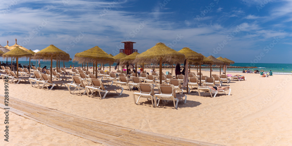 Sandy city beach in Cadiz on a sunny day.