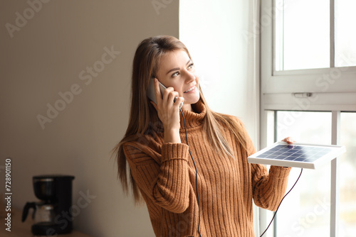 Pretty young woman charging...