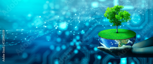 Hand holding haft of Earth with Tree growing on. Eco Technology and Technology Convergence. Green Computing, Green Technology, Green IT, csr, and IT ethics Concept. Image furnished by NASA.