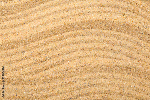 Closeup view of sand texture with lines. Zen concept