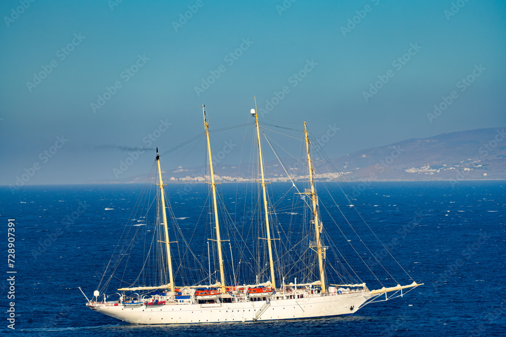 4 Masts sailboat at the Southern Aegean Sea near Mykonos island. Greece 4 Masts sailboat at the Southern Aegean Sea near Mykonos island. Greece